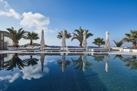 Outdoor pool, pool umbrellas, sun loungers