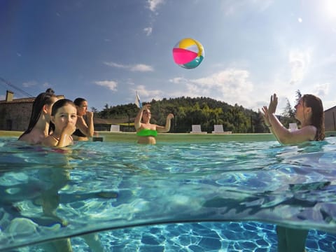 Seasonal outdoor pool, open 10:00 AM to 8:00 PM, sun loungers
