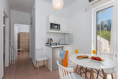 Mini-fridge, stovetop, coffee/tea maker, electric kettle