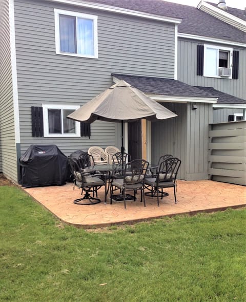 STAMPED CONCRETE PATIO/SEATING FOR 12 (EXTRA TABLES IN THE SHED