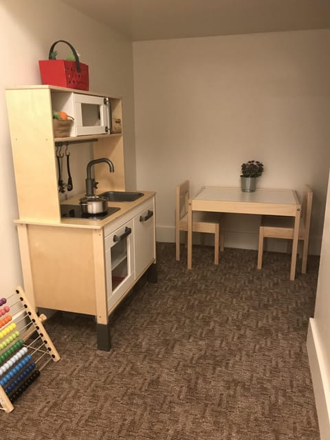 Kids play area under stairs