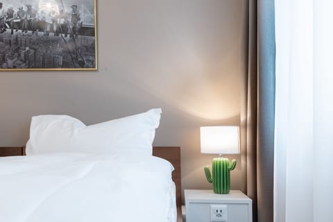 Twin Room, Garden View | Desk, iron/ironing board, free cribs/infant beds, free WiFi