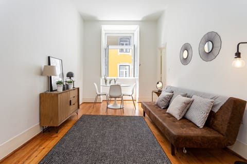 Standard Apartment, 2 Bedrooms, City View | Living area | 32-inch TV with cable channels