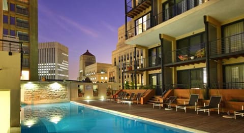 Outdoor pool, pool umbrellas, sun loungers