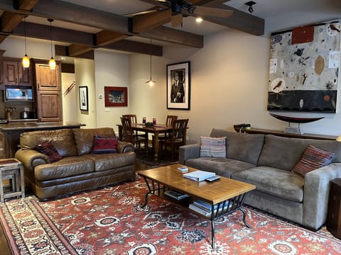 Living area with dining area in the background