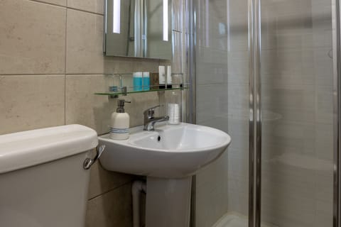 Shower, free toiletries, hair dryer, towels