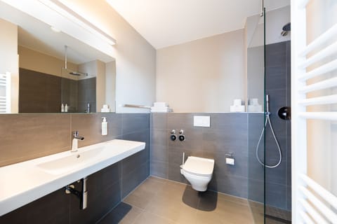 Free toiletries, hair dryer, heated floors, towels