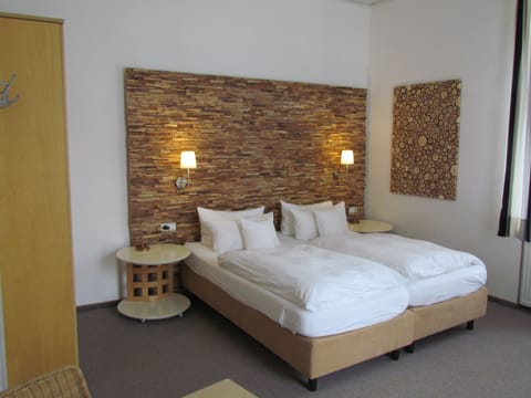 Design Double Room | Hypo-allergenic bedding, down comforters, in-room safe