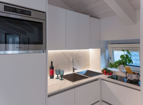 Apartment, Private Bathroom, City View | Private kitchen | Full-size fridge, electric kettle