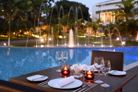 Outdoor pool, open 7 AM to 7 PM, pool umbrellas, sun loungers