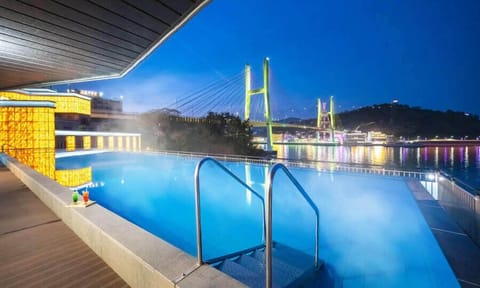 Outdoor pool, open 1:00 PM to 10:00 PM, sun loungers