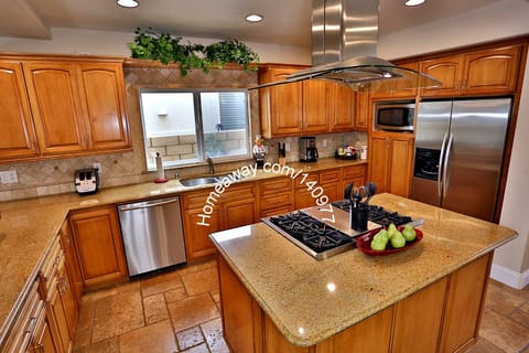 Gourmet Kitchen, fully stocked with quality pots, pans and dishes. Wolf Range