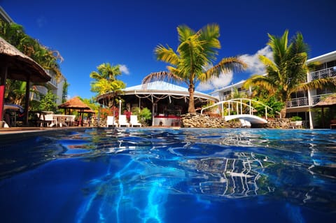 Outdoor pool, pool umbrellas, sun loungers