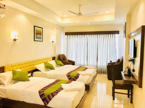Grand Triple Room, Multiple Beds | Desk, iron/ironing board, free WiFi, bed sheets