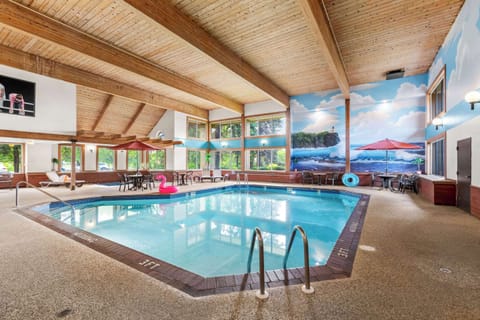 Indoor pool, open 8:00 AM to 11:00 PM, pool umbrellas