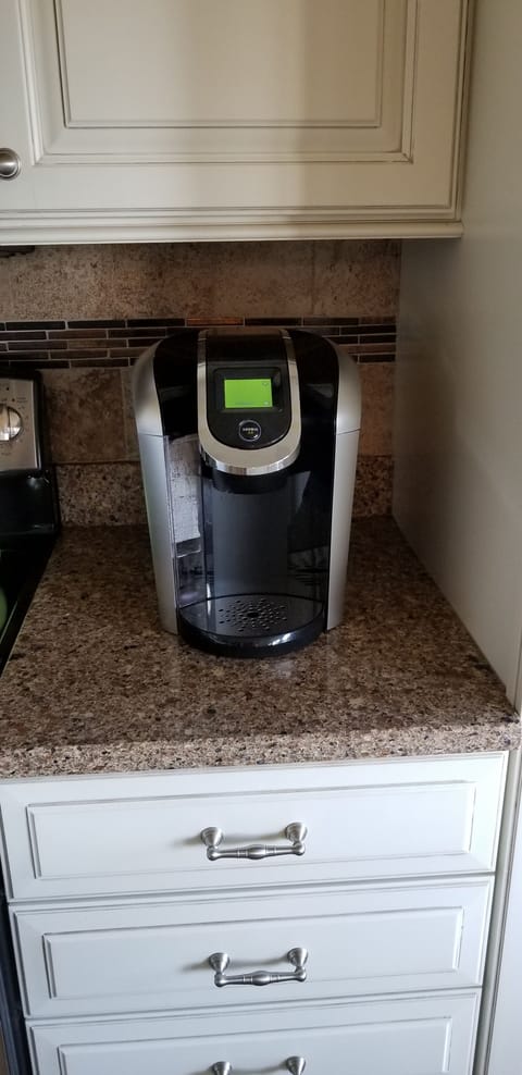 Both a regular coffee maker and a Keurig maker for your enjoyment.