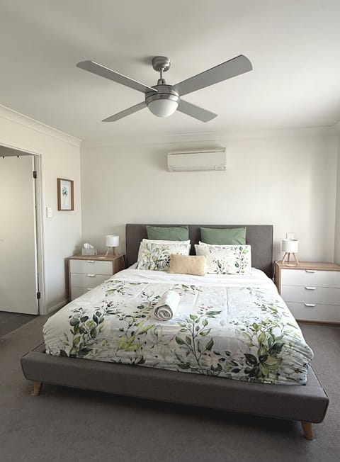 Master bedroom with king bed, Air con and ceiling fan.