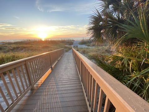 Morning sunrise walking out to the beach over private gated beach access
