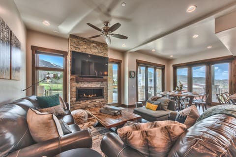 Great Room with Living Room, Dining Area and Kitchen with Beautiful Hardwood Floors Throughout