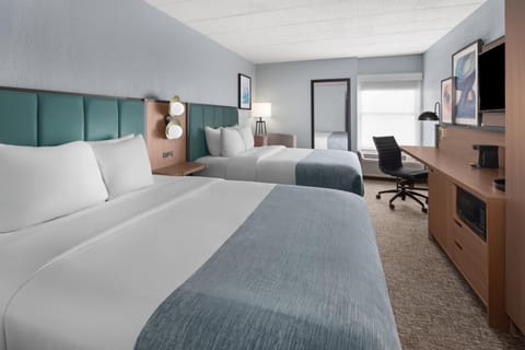 Room, 2 Queen Beds, Non Smoking | Desk, laptop workspace, blackout drapes, iron/ironing board
