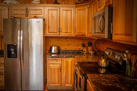 View of kitchen from dining table