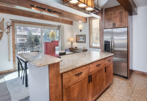 Condo, 2 Bedrooms | Private kitchen | Fridge, microwave, oven, dishwasher