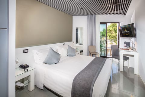 Premium bedding, down comforters, pillowtop beds, minibar