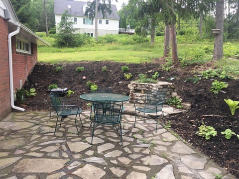 Outside patio with table and 4 chairs