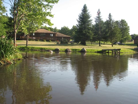 View of log home from pond