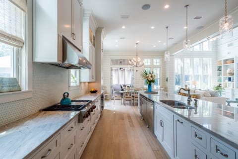 Kitchen opens up to large second den. 2 dishwashers, top end appliances.