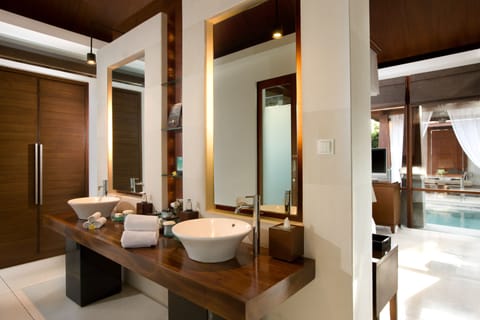 Separate tub and shower, hair dryer, bathrobes, slippers