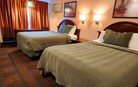 Standard Room, 2 Queen Beds | Laptop workspace, iron/ironing board, free WiFi, bed sheets