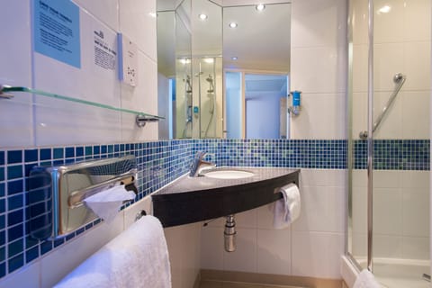 Shower, eco-friendly toiletries, hair dryer, towels