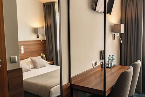 Desk, free WiFi, bed sheets