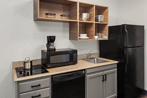 Desk, laptop workspace, blackout drapes, iron/ironing board