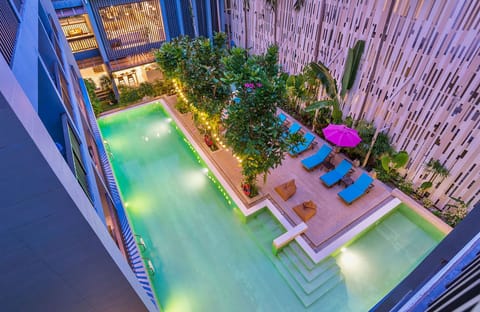 Deluxe Room, Pool View | Premium bedding, minibar, in-room safe, desk