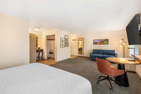 Down comforters, desk, laptop workspace, blackout drapes