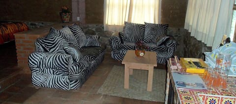 Suite, Multiple Beds | Living area