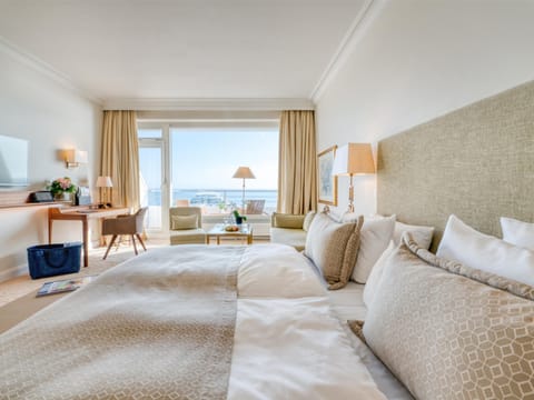 Junior Suite with Sea View (2nd-4th floor) | Down comforters, minibar, in-room safe, individually furnished