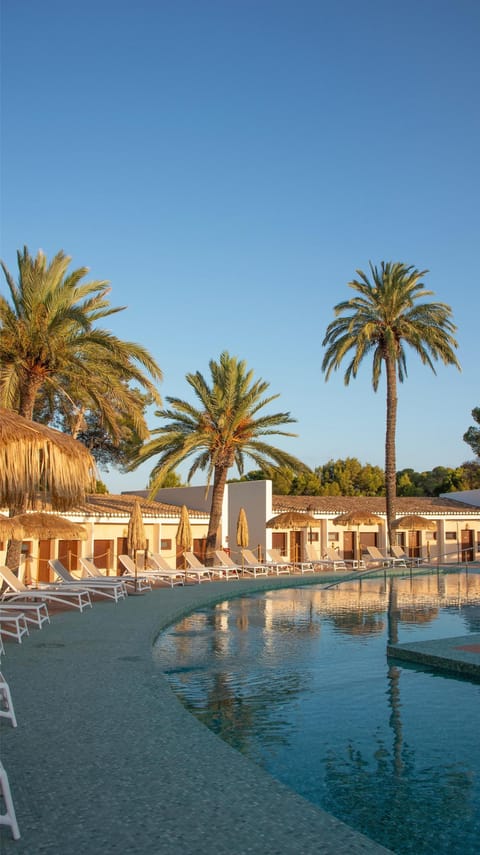 Outdoor pool, open 11:00 AM to 7:00 PM, pool umbrellas, sun loungers