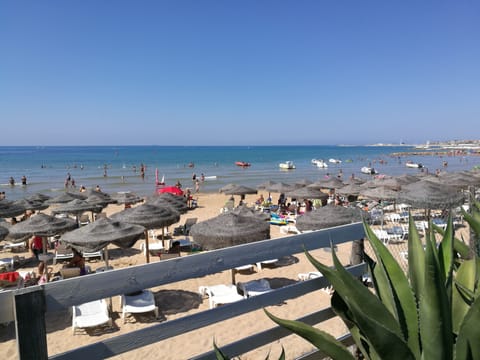 Private beach nearby, sun loungers, beach umbrellas