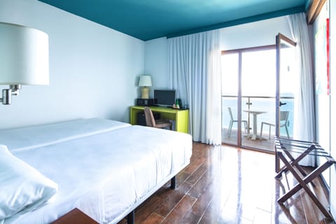 Room, Sea View | Minibar, in-room safe, desk, blackout drapes