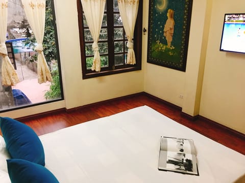 Deluxe Double Room, Garden View (Sea Style) | Desk, blackout drapes, iron/ironing board, free WiFi