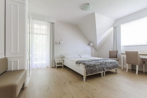 Deluxe Double Room | Living area | LCD TV