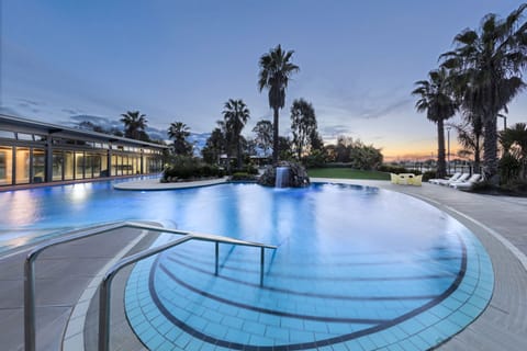 Indoor pool, outdoor pool, open 8:00 AM to 8:00 PM, sun loungers