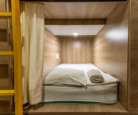Economy Shared Dormitory, Women only | Iron/ironing board, WiFi (free), bed sheets