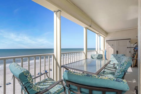 Dining table on large balcony with spectacular view. Beach Gear Closet.