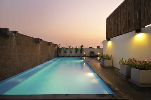 Outdoor pool, open 9 AM to 8 PM, sun loungers