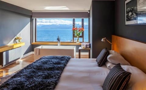 Suite, 1 King Bed, Lake View (Pool Access) | Minibar, in-room safe, individually decorated, individually furnished