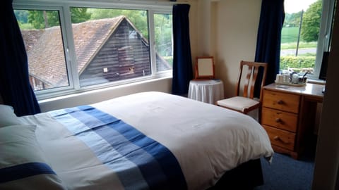 Double Room | Iron/ironing board, free cribs/infant beds, free WiFi, bed sheets